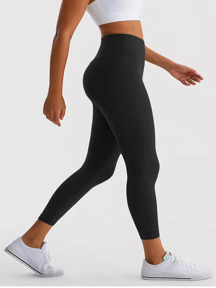 High-waisted dames legging met slim fit. Comfortabele stretch stof, ideaal voor yoga, fitness & vrije tijd.