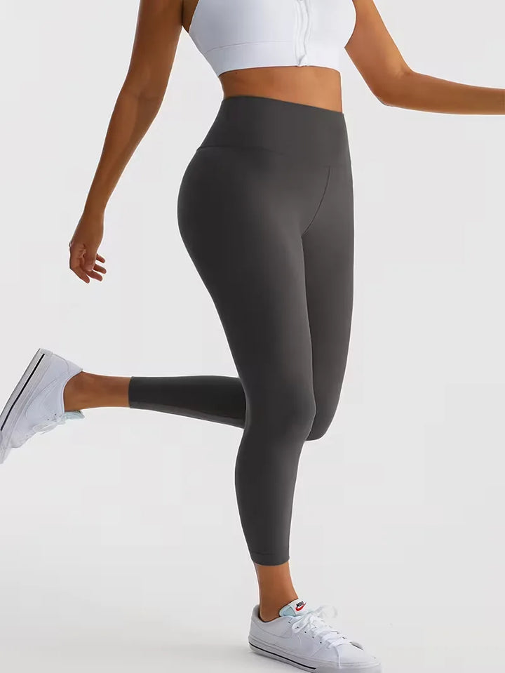 Comfortabele effen dames legging, high-waisted en slim fit. Ideaal voor yoga, fitness en dagelijks gebruik.