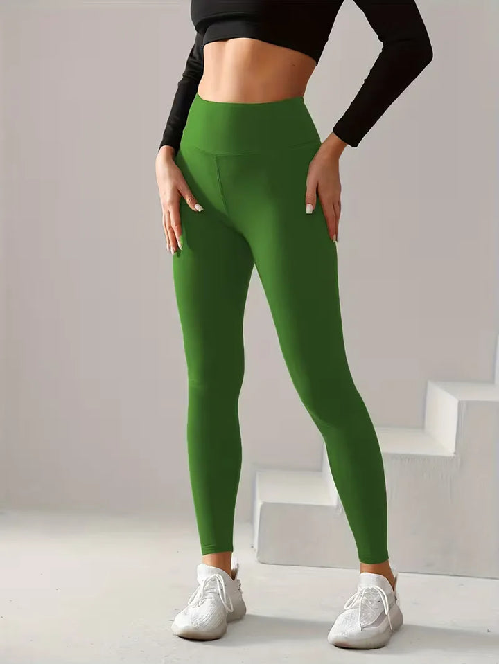Veelzijdige slim fit dames legging, high-waisted en enkellengte. Geschikt voor sport, casual zomer & lente.