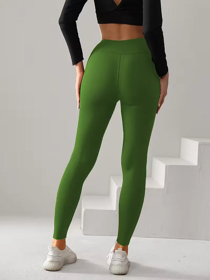 Sportieve high-waisted dames legging, slim fit. Effen, comfortabel voor fitness, yoga en actieve levensstijl.