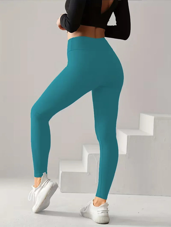 Effen high-waisted dames legging, slim fit. Comfortabele stretch voor fitness, yoga en casual lente.