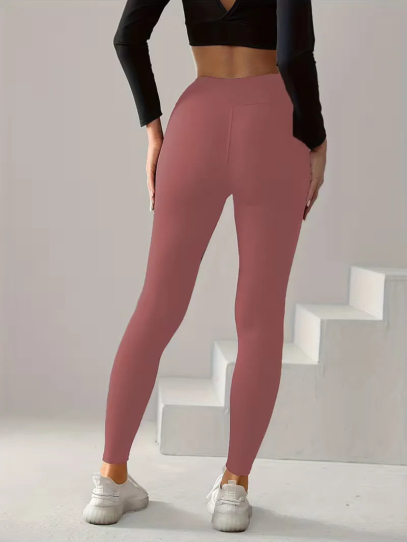 Effen, comfortabele slim fit dames legging, high-waisted. Perfect voor yoga, sport en casual lente/zomer.