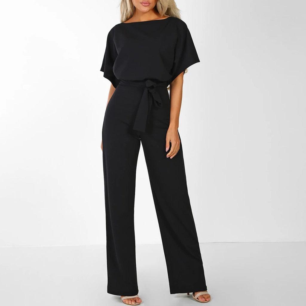 Modieuze dames jumpsuit met ceintuur en korte mouwen, accentueert de taille, comfortabel model.