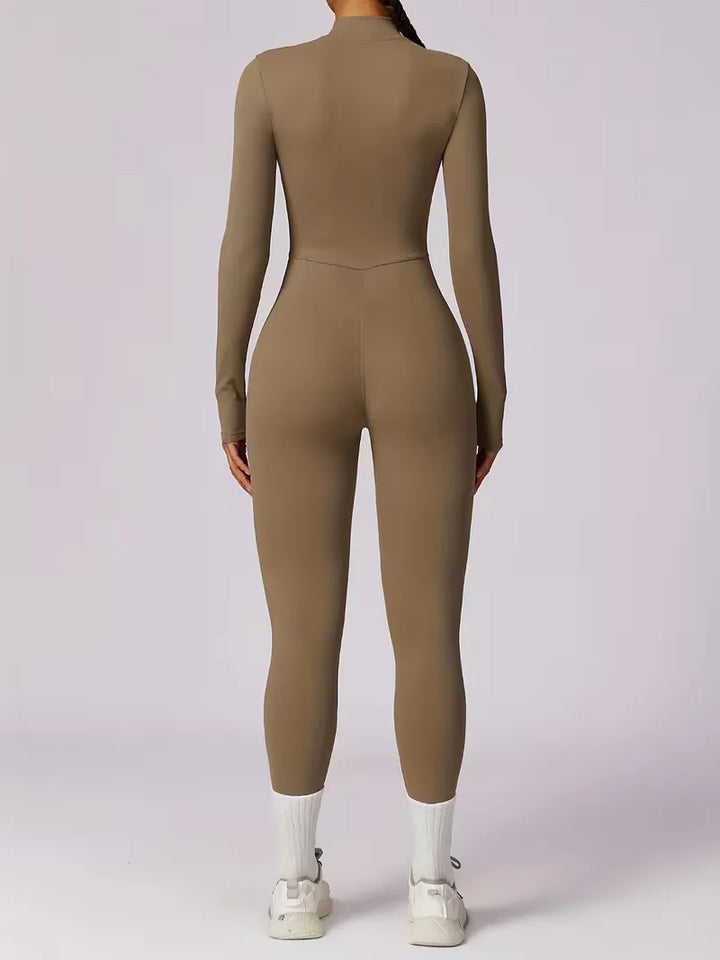Comfortabele rekbare dames jumpsuit met lange mouwen en hoge taille, perfecte sportoutfit.