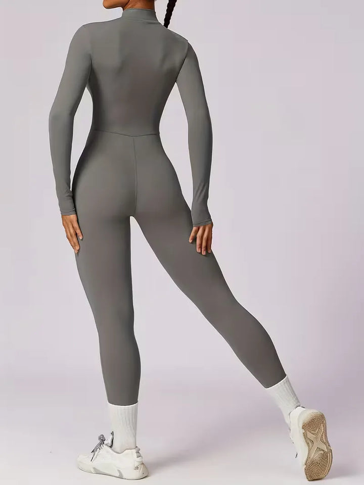 Stijlvolle dames jumpsuit met mock halslijn, slanke pasvorm voor actieve vrouwen, lange mouwen.