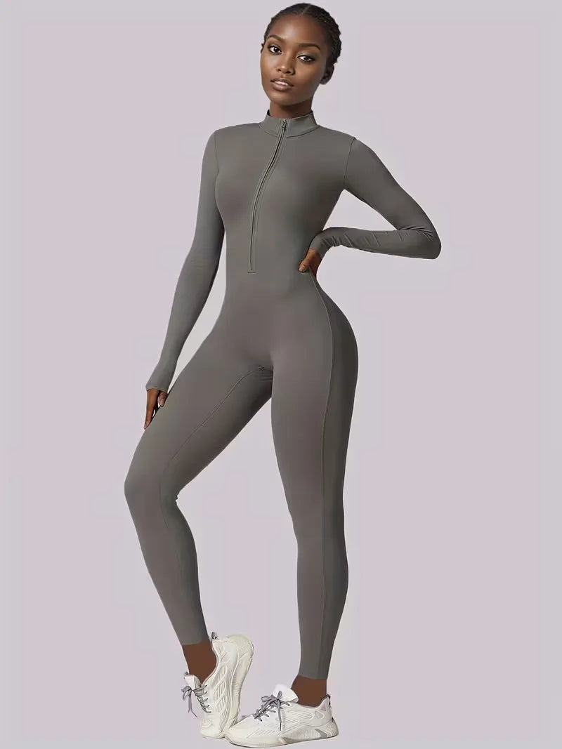 Fitnesskleding: rekbare dames jumpsuit met lange mouwen, comfortabel en sportief voor workouts.