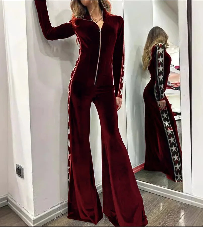 Elegante dames jumpsuit met modieuze wijde pijpen en sterrenprint, ideaal voor een comfortabele en stijlvolle uitstraling.