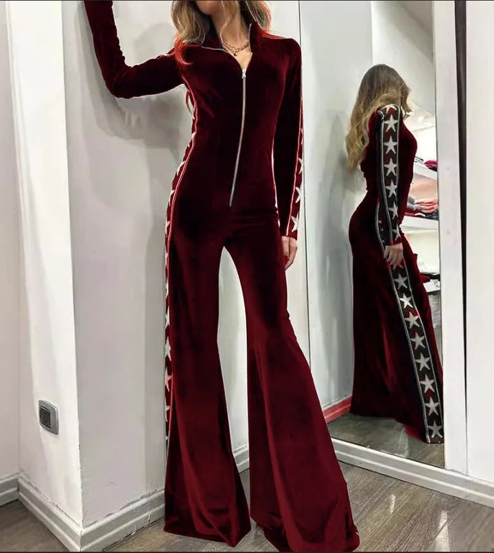 Elegante dames jumpsuit met modieuze wijde pijpen en sterrenprint, ideaal voor een comfortabele en stijlvolle uitstraling.