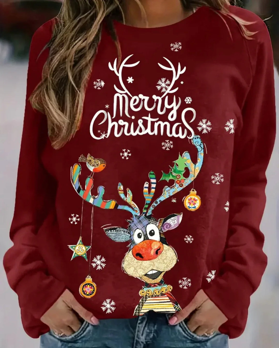 "Dames kersttrui met speelse rendierprint, raglanmouwen en ronde hals, ideaal voor feestdagen, comfortabel en stijlvol."