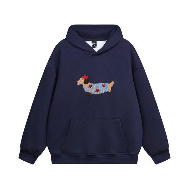 Warme dames trui met speels teckel design. Een comfortabele en knusse hoodie voor herfst/winter.