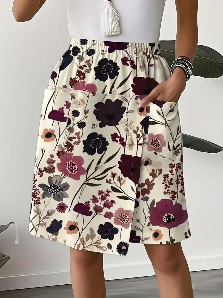 Dames korte broek met vrolijke bloemenprint, ideaal voor zomerse dagen. Comfortabel en stijlvol.