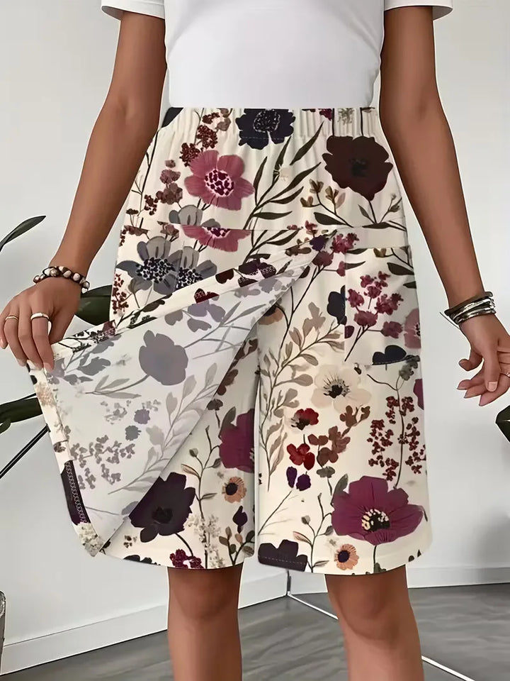 Comfortabele dames korte broek met trendy bloemenprint, ideaal voor lente, zomer of herfst. Zacht en veelzijdig.