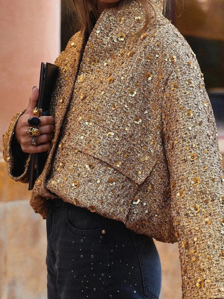 Glanzende dames korte glitterjas met kraag; voegt een modieuze en feestelijke touch toe aan elke outfit.