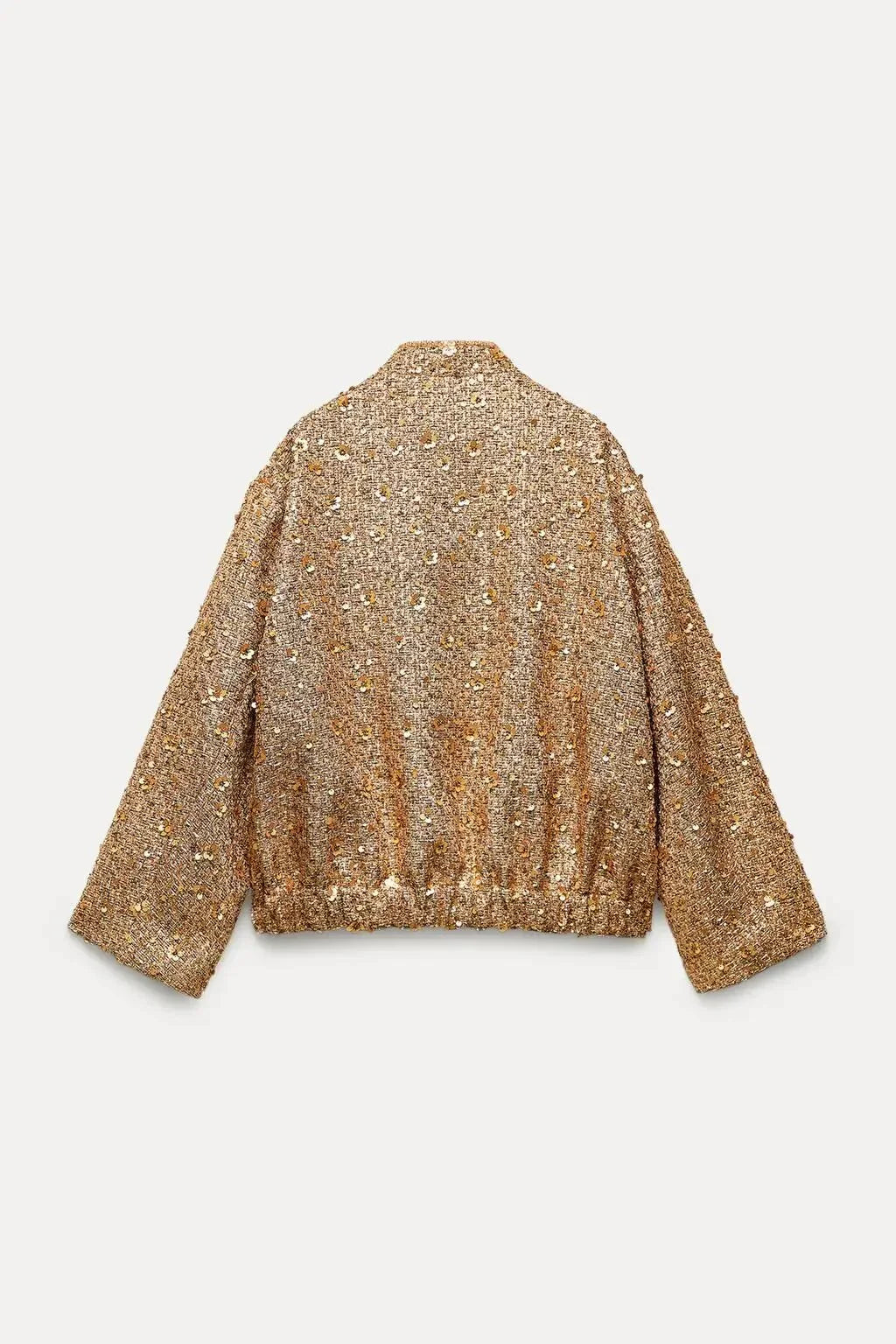 Veelzijdige korte damesjas met glitter en kraag; stijlvol, comfortabel en chique voor diverse gelegenheden.