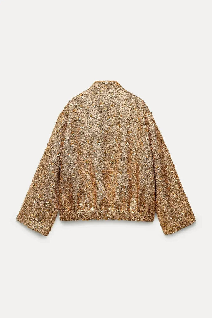 Veelzijdige korte damesjas met glitter en kraag; stijlvol, comfortabel en chique voor diverse gelegenheden.