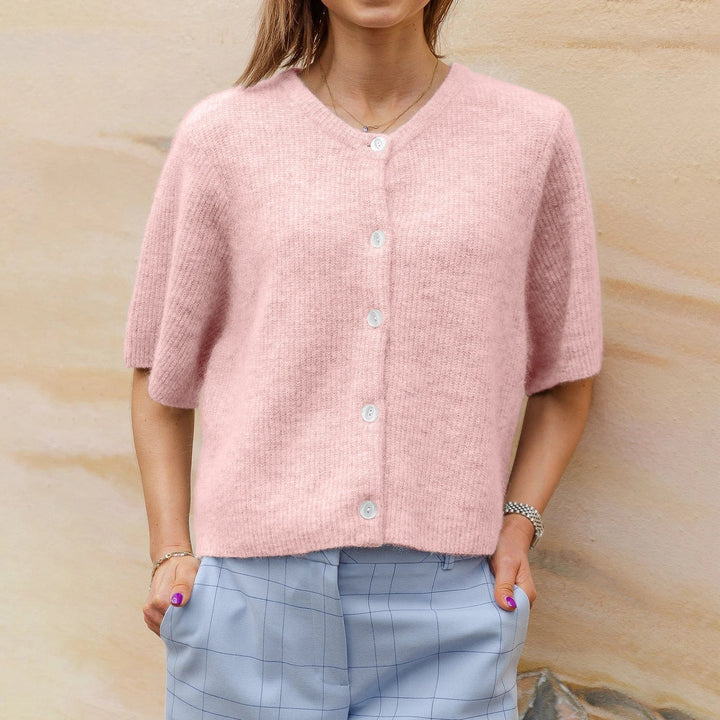 Stijlvolle dames top met korte mouwen, streetwear flair. Comfortabele Y2K blouse, trendy voor elke casual gelegenheid.