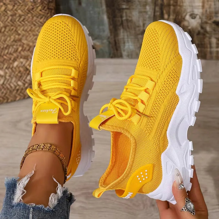 Zwarte dames lage sneaker, veelzijdig en comfortabel, een must-have mode-item voor elke dag.