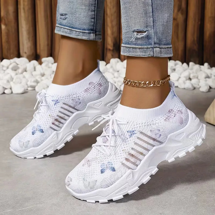 Vrouwen lage sneaker met unieke vlinderprint. Casual, comfortabel en modieus met platformzool.