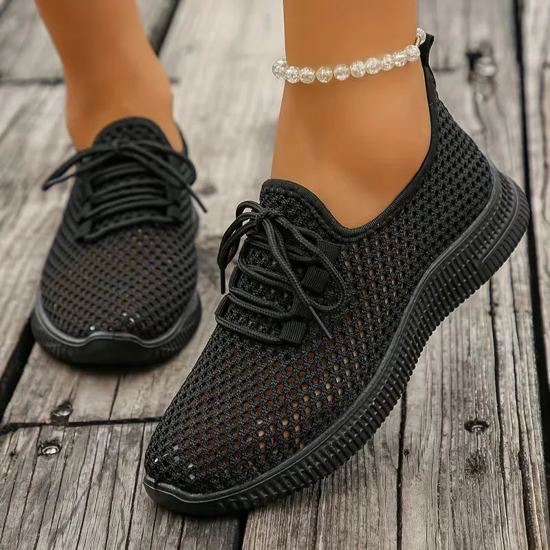 Comfortabele dames lage sneakers met ademend geweven design en platte zool, geschikt voor dagelijks gebruik.