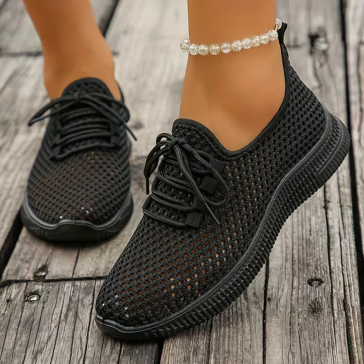 Comfortabele dames lage sneakers met ademend geweven design en platte zool, geschikt voor dagelijks gebruik.