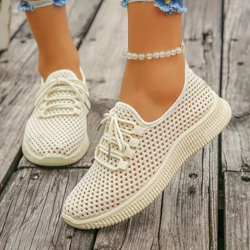 Casual dames lage sneakers met veelkleurig geweven design, veters en comfortabele zool, ideaal voor trendy look.