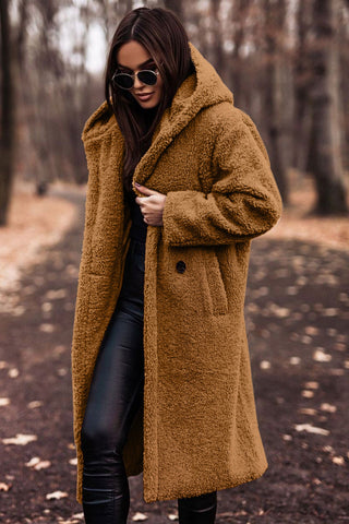 Heerlijke warmte: dames lange teddy jas met capuchon, een fashion statement voor de winter.