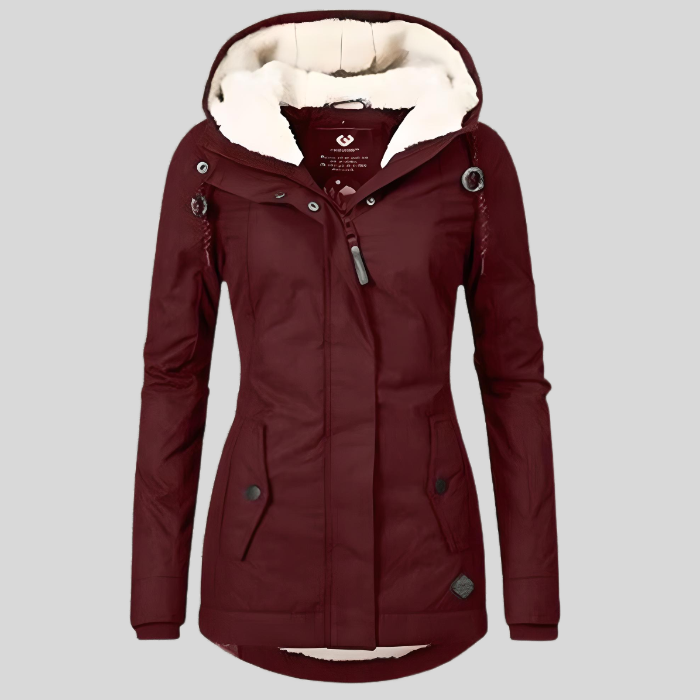 Detail van de capuchon van een lange waterdichte dames winterjas, beschermt tegen weer en wind.