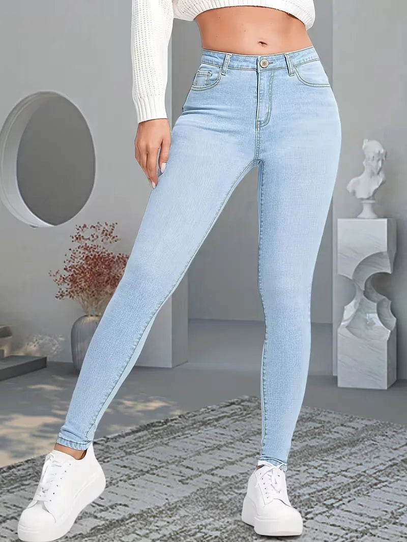 Dames lichtblauwe skinny jeans met hoge taille, slim fit en enkellengte voor een casual zomerlook.