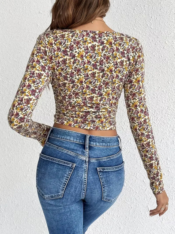 Stijlvolle dames longsleeve, vierkante hals, bloemenprint. Een elegante toevoeging aan je herfstgarderobe.