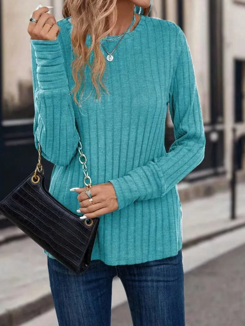 Smartcasual dames longsleeve met ribstructuur, lange mouwen, een trendy en comfortabele keuze.