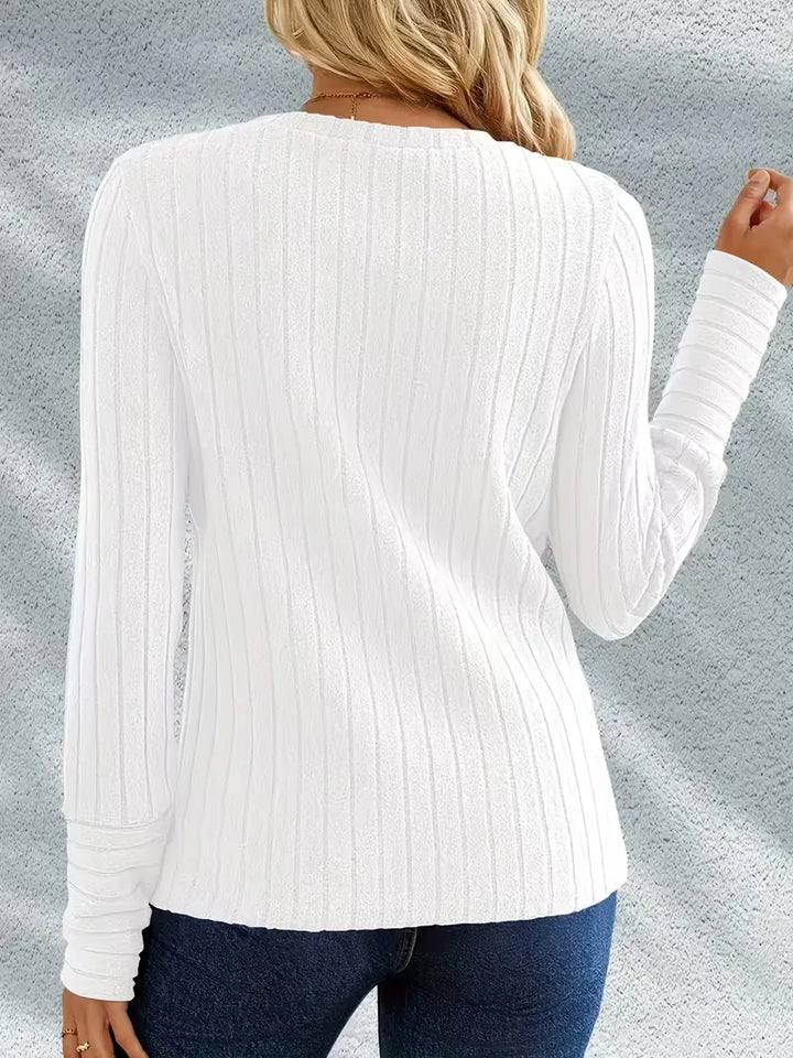 Comfortabele dames longsleeve met ribstructuur, lange mouwen, ronde hals voor herfst en lente.