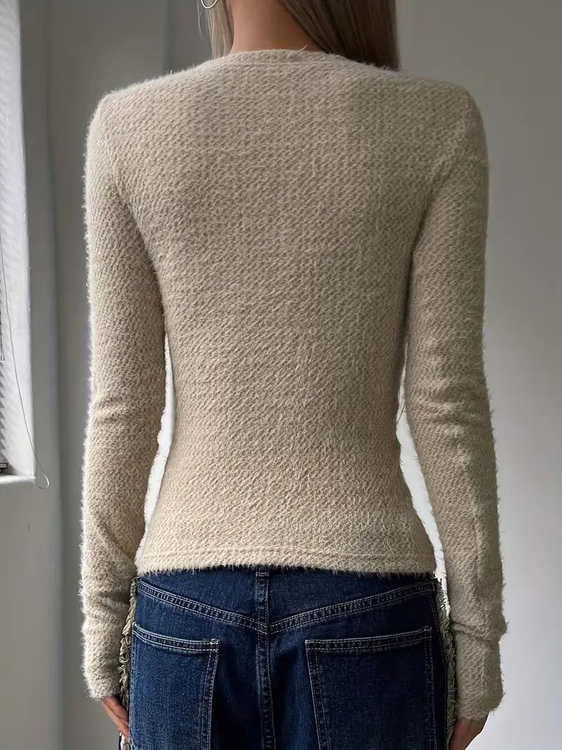 Stijlvolle dames longsleeve met ronde hals, perfect voor lente en herfst.