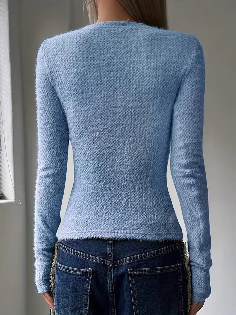 Klassieke dames longsleeve met ronde hals, tijdloze herfst mode.