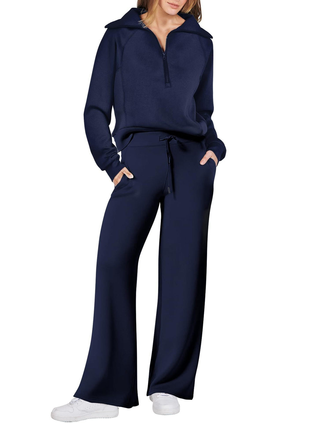 Gemakkelijke dames lounge set met ritssluiting. Modieuze tweedelige outfit, ideaal voor comfort thuis.