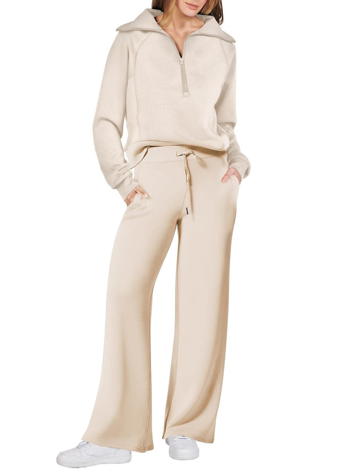 Trendy dames lounge set tweedelig, met modieuze ritssluiting. Comfortabele vrouwenmode voor thuis.