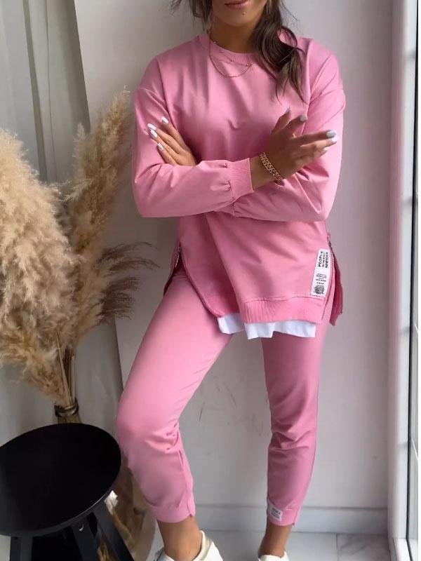 "Dames loungewear set, zachte katoen-polyester mix, relaxed sweatshirt en taps toelopende broek, stijlvol en comfortabel."
