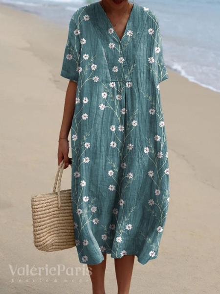 Strandjurk of vakantie jurk: deze comfortabele damesjurk met bloemenprint is veelzijdig.