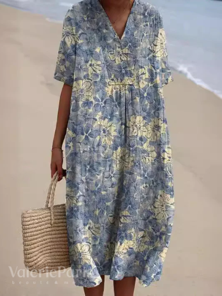 Vrouwenkleding: elegante luchtige jurk met bloemenprint, ideaal voor warme dagen.