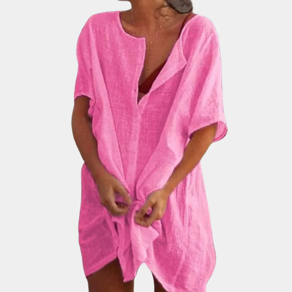 Stijlvolle dames strandtuniek van linnenblend, luchtig en ademend voor warme dagen.