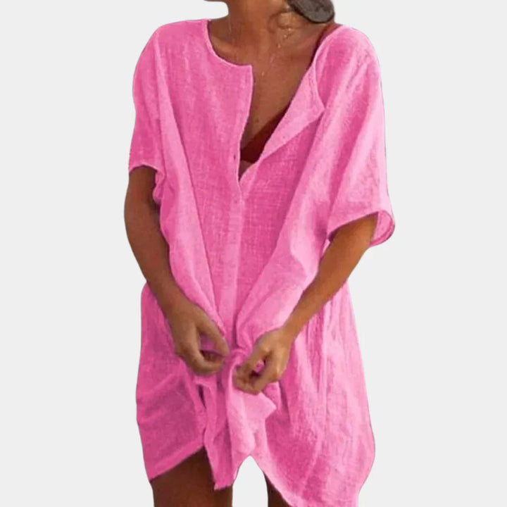 Stijlvolle dames strandtuniek van linnenblend, luchtig en ademend voor warme dagen.