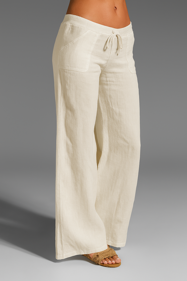 Close-up van de zachte stof en elastische taille van de luchtige dames zomerbroek.