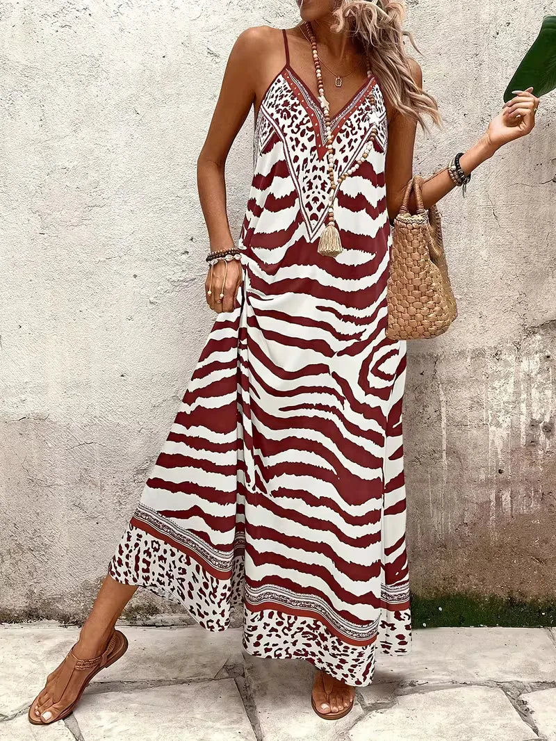 Dames maxi jurk met bohemian leopard print, perfect voor zomerse dagen.