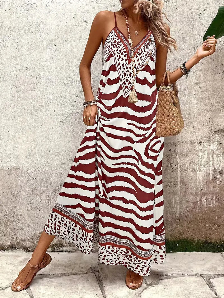 Dames maxi jurk met bohemian leopard print, perfect voor zomerse dagen.
