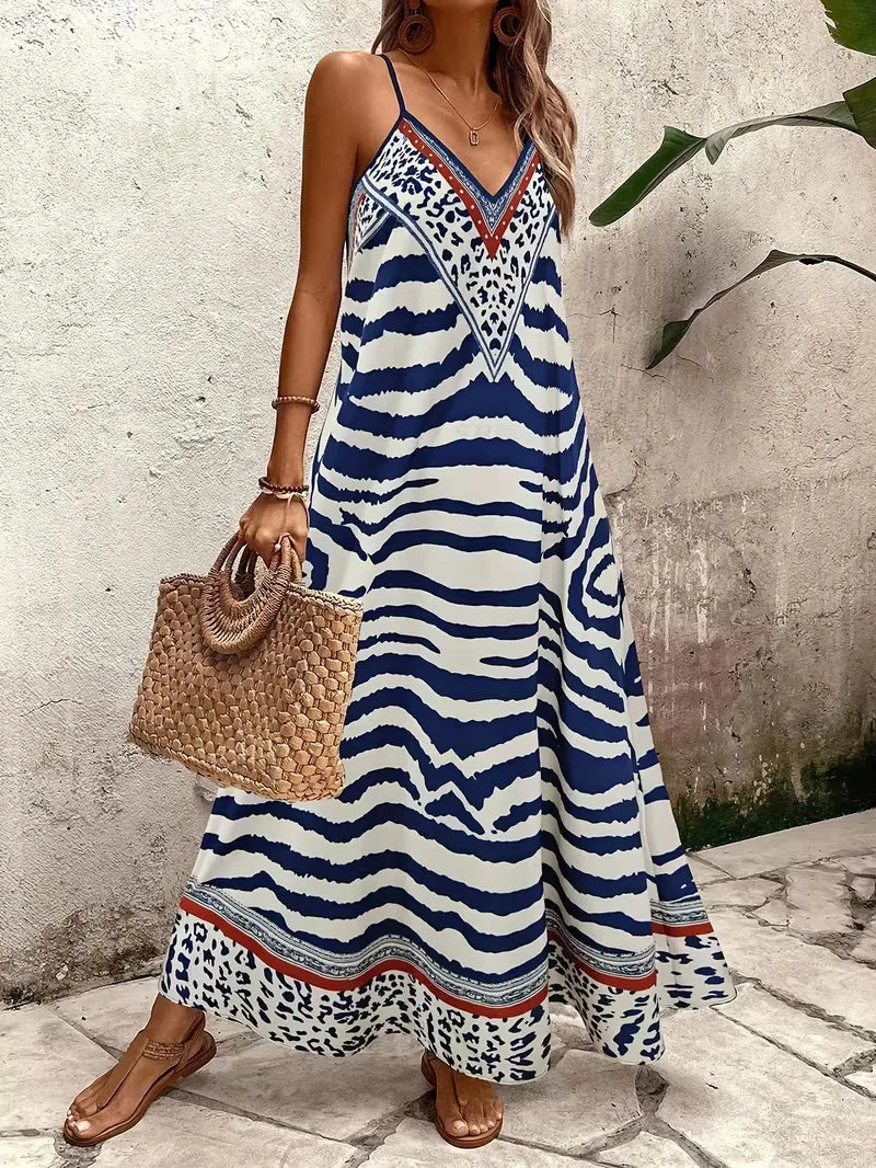 Luchtige dames maxi jurk met spaghettibandjes en stijlvolle leopard print.