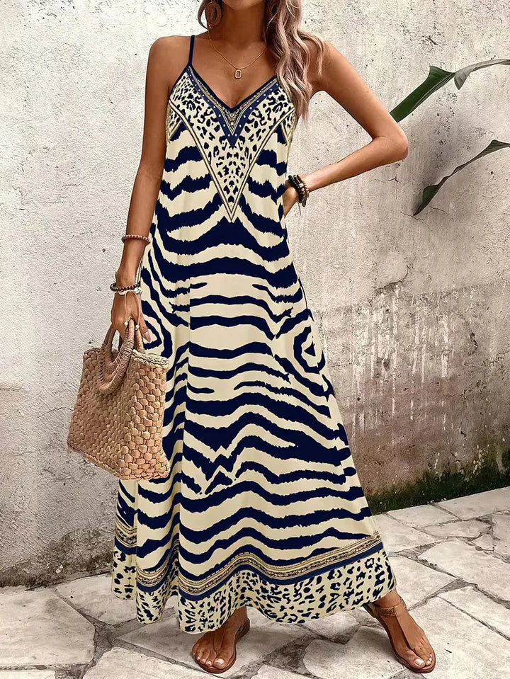 Heerlijke vakantie maxi jurk met comfortabele pasvorm en leopard design.