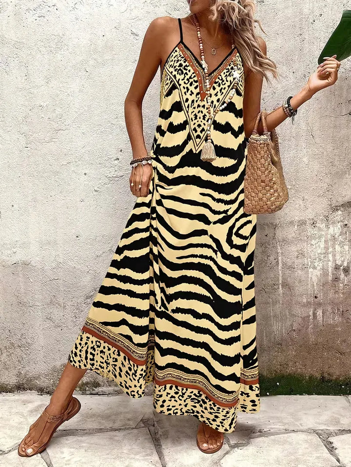 Boho-chic maxi jurk met leopard print, comfortabel en luchtig.