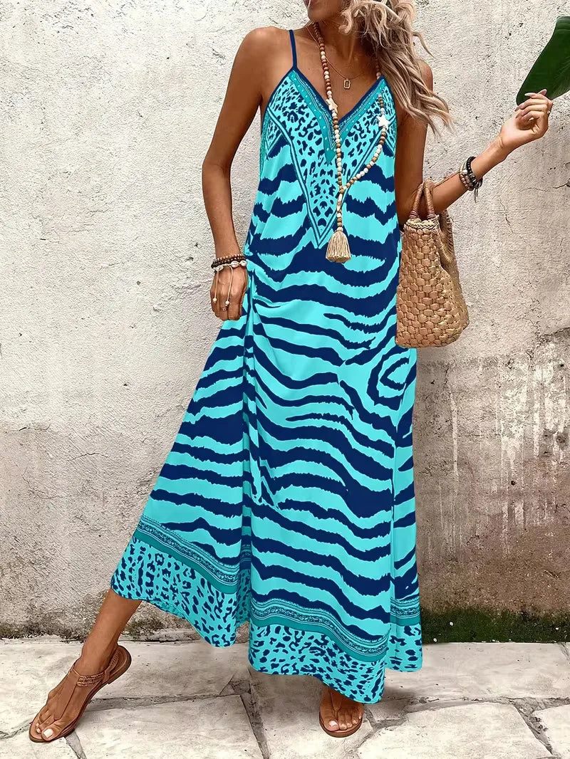 Trendy lange maxi jurk met bohemian leopard print, perfect voor elk uitje.
