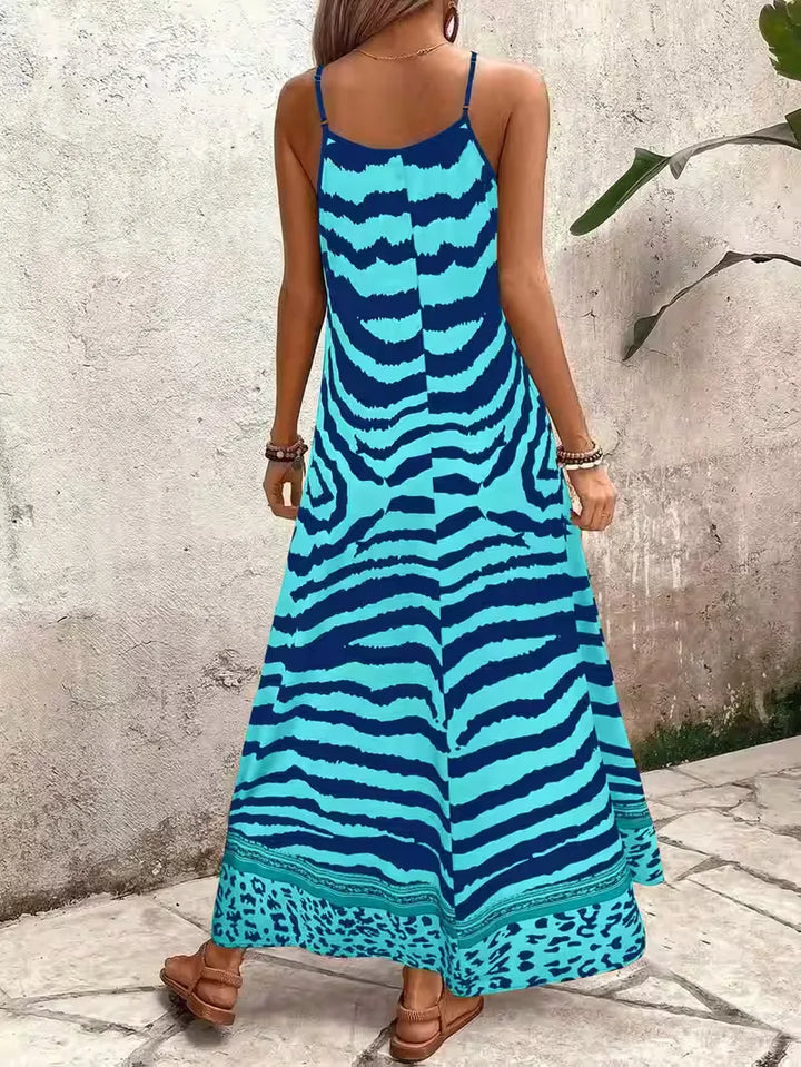 Dames zomerjurk met spaghettibandjes, comfortabele pasvorm en leopard print.