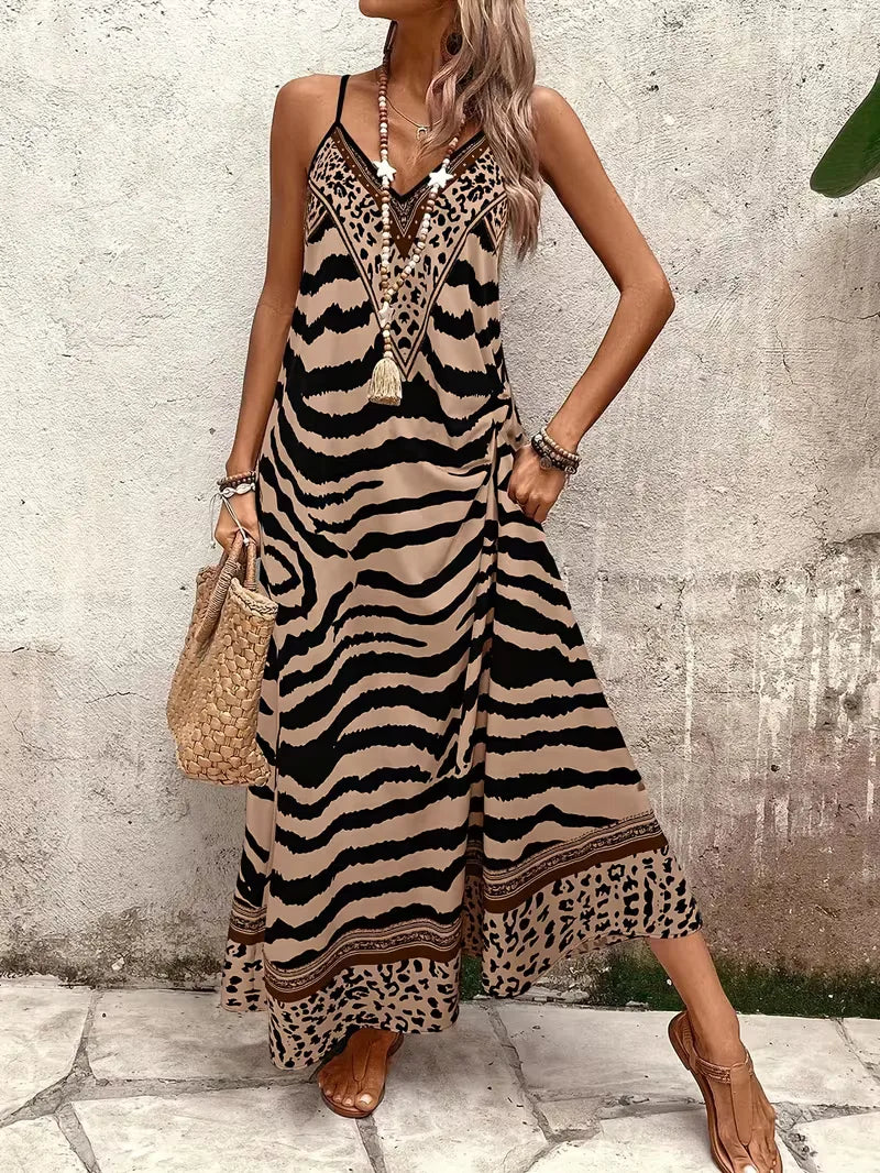 Lange zomerjurk met vrolijke leopard print, ideaal voor een vakantiegevoel.