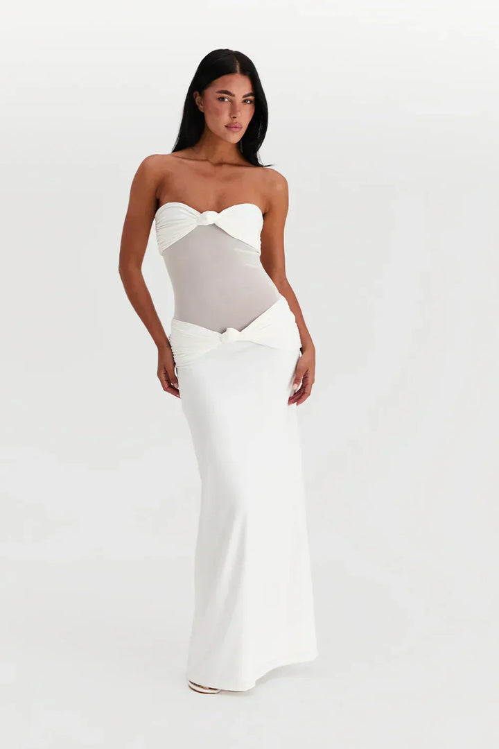 Dames maxi jurk met elegante plooien, zowel strapless als met bandjes te dragen. Perfect voor zomer en feestjes.